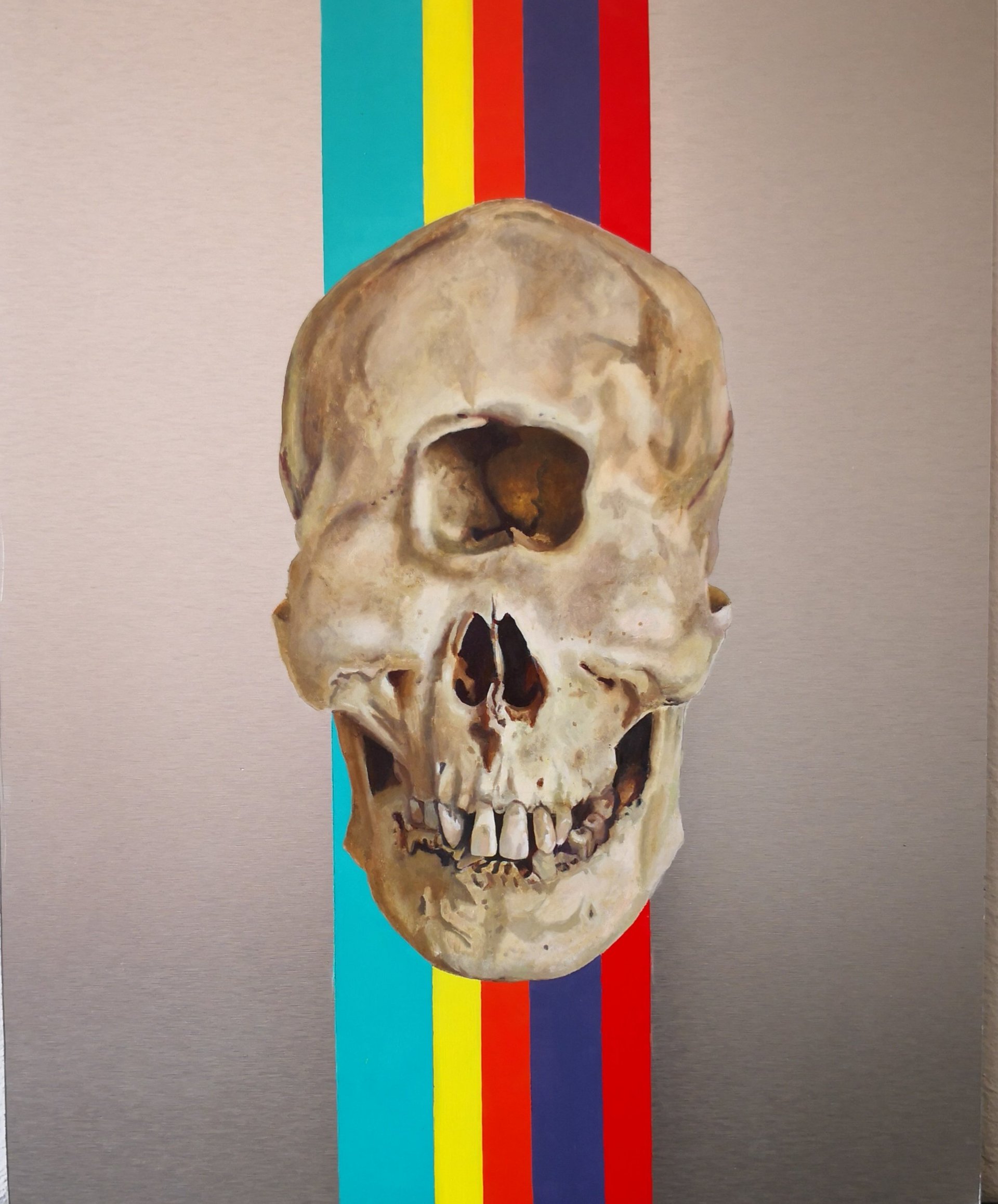 Human skull on pale background with vertical stripes in turquoise, yellow, red, dark blue, and red